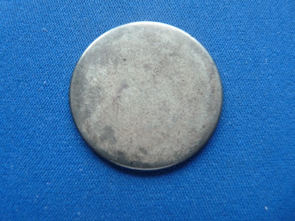 Dollar Planchet-- .7 ounces