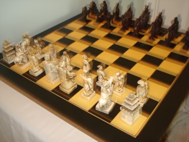 HAND CARVED BONE CHESS SET ASIAN THEME