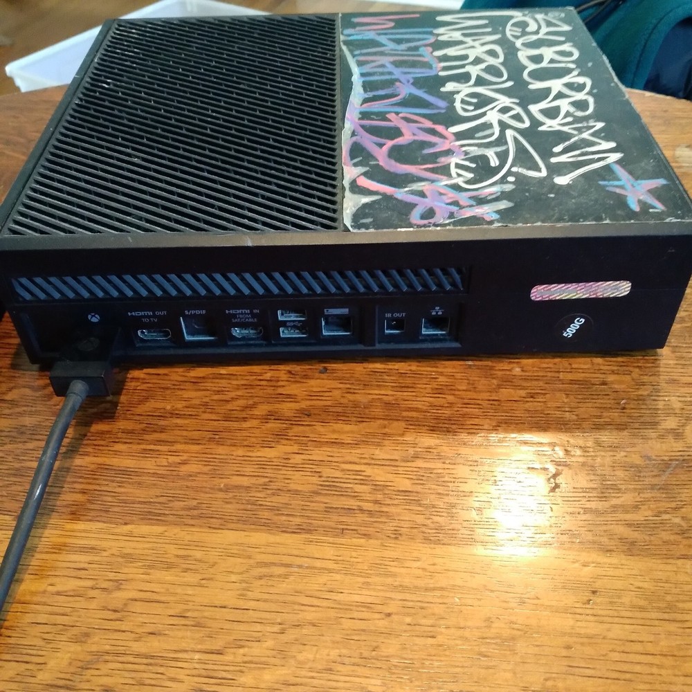 Xbox One Console with power cord and 4 games