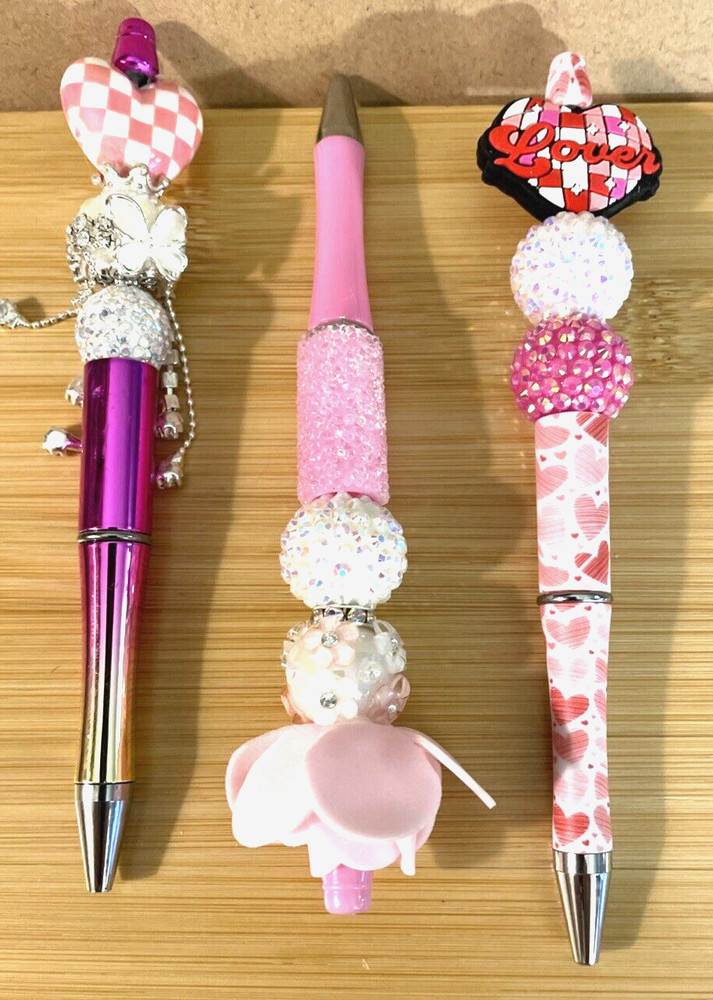 3 miscellaneous beaded pens with 1 ink refill each