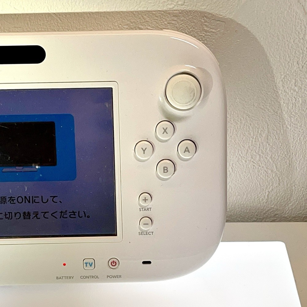 Nintendo WII U Bundle Set - Includes two handles and two controllers. Initialize