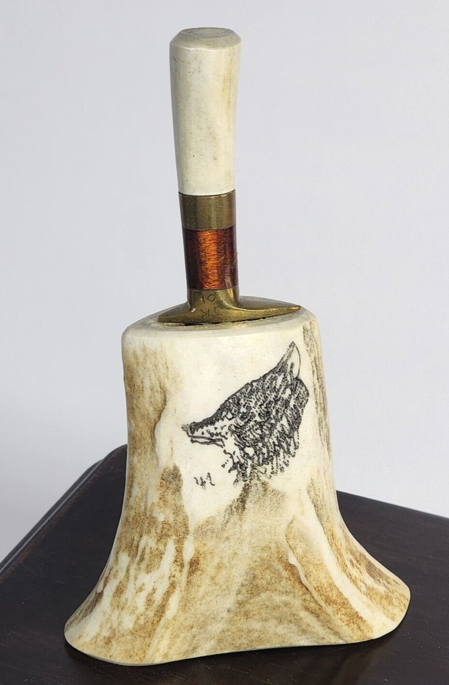 Small Knife In Bone looking Holder With Wolf On