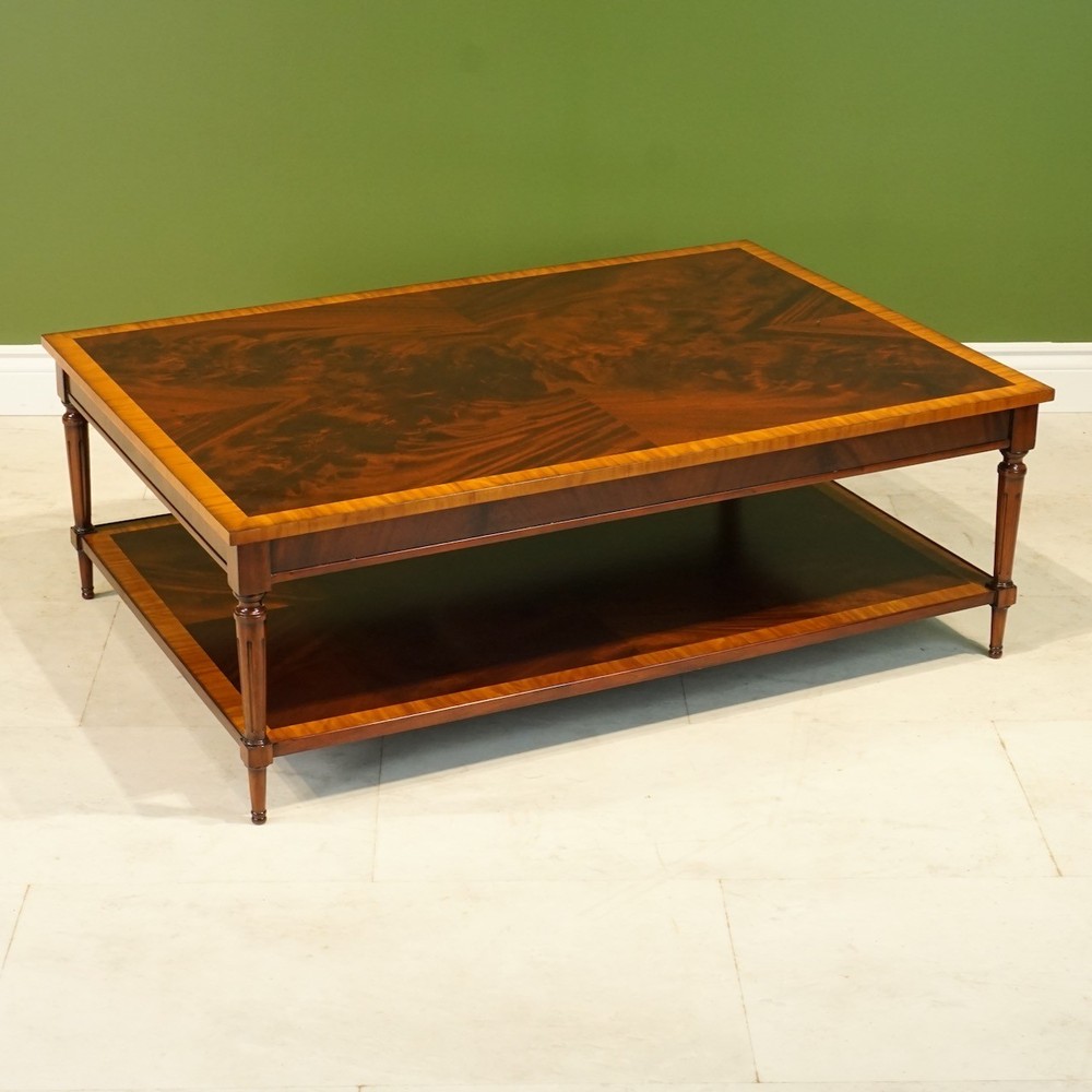 Rectangular Flamed Mahogany Coffee table with banding and lower shelf