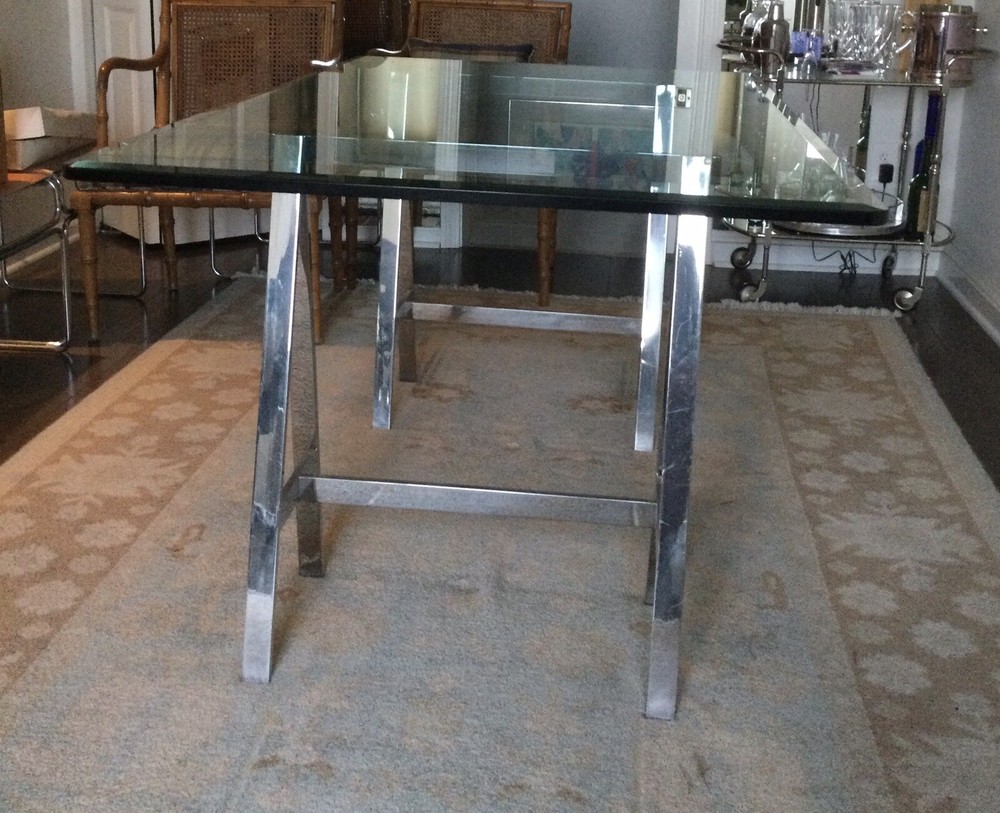 Heavy Glass Top Rectangular Dining Table. Beveled Edge. Stainless Steel Bases.