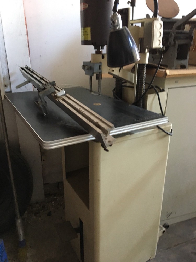 Acme Book Drilling Machine