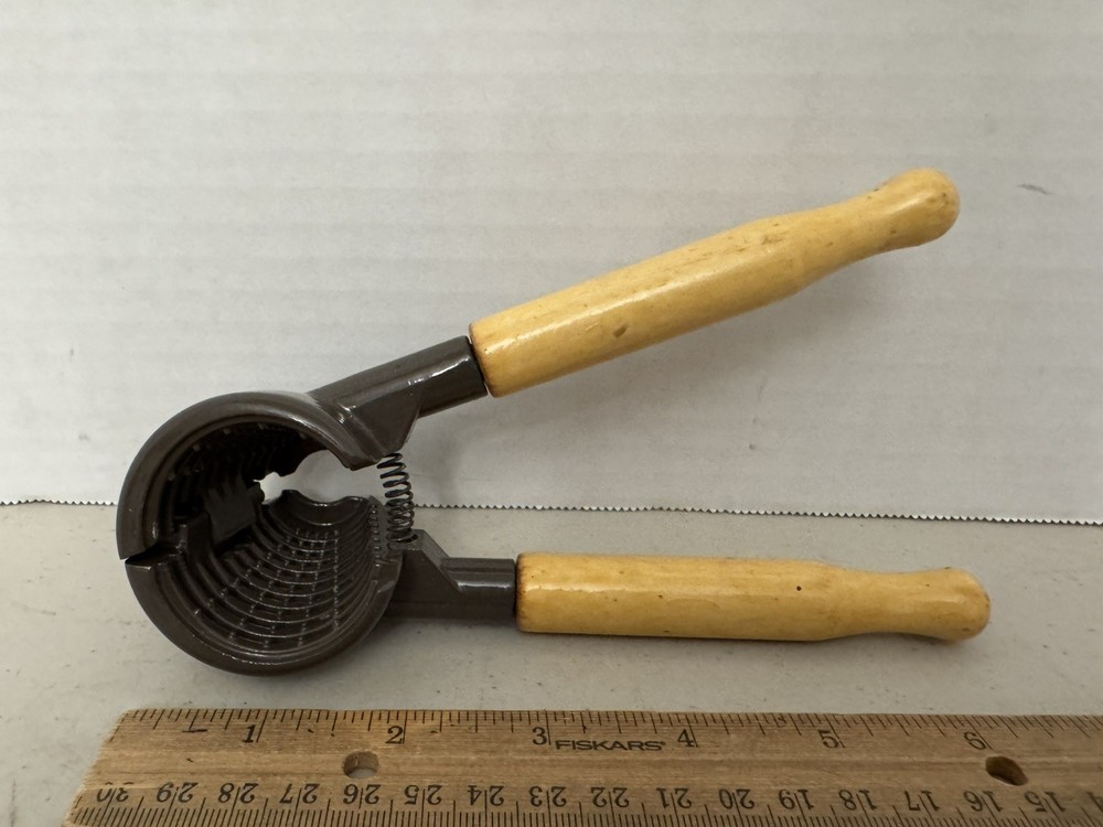 Multifunction 2 in One Tool....Nut Cracker and Bottle Opener