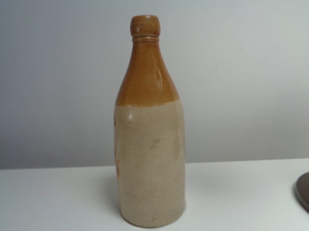 An Old MACFARLANE & SONS Stoneware Bottle Weston Super Mare Burnham