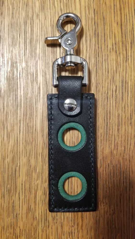 Green and black 2 hole Leather Pool Cue Thread Protector Holder