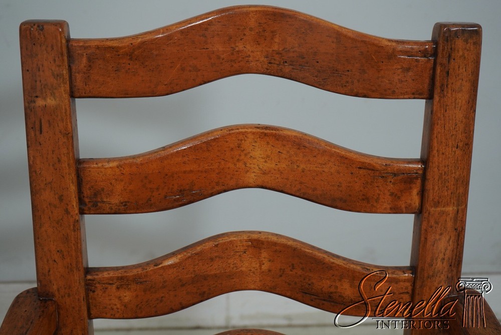 68471: Pair GUY CHADDOCK Distressed Ladderback Armchairs