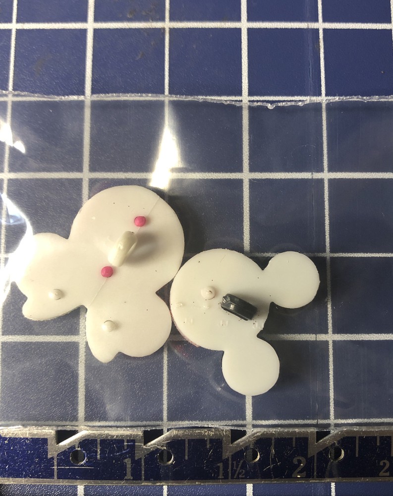 Buttons mouse hats, boy and girl. One pair