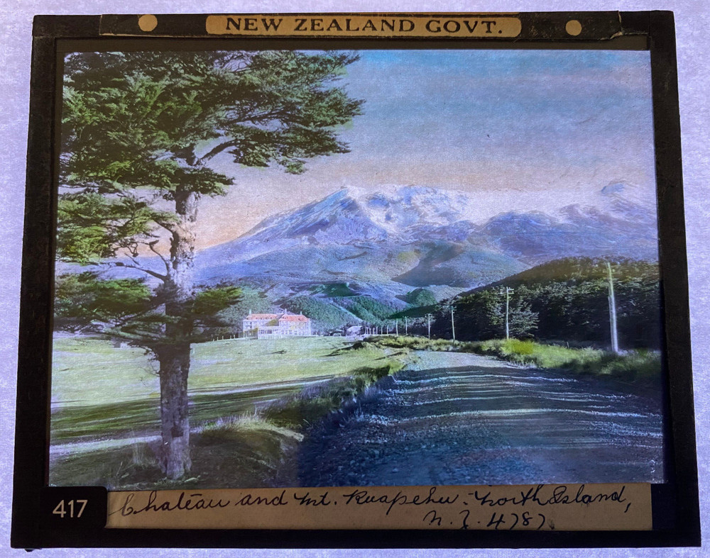 COLORED MAGIC LANTERN SLIDE NEW ZEALAND GOV'T CHATEAU & MT RUAPEHU 1920s