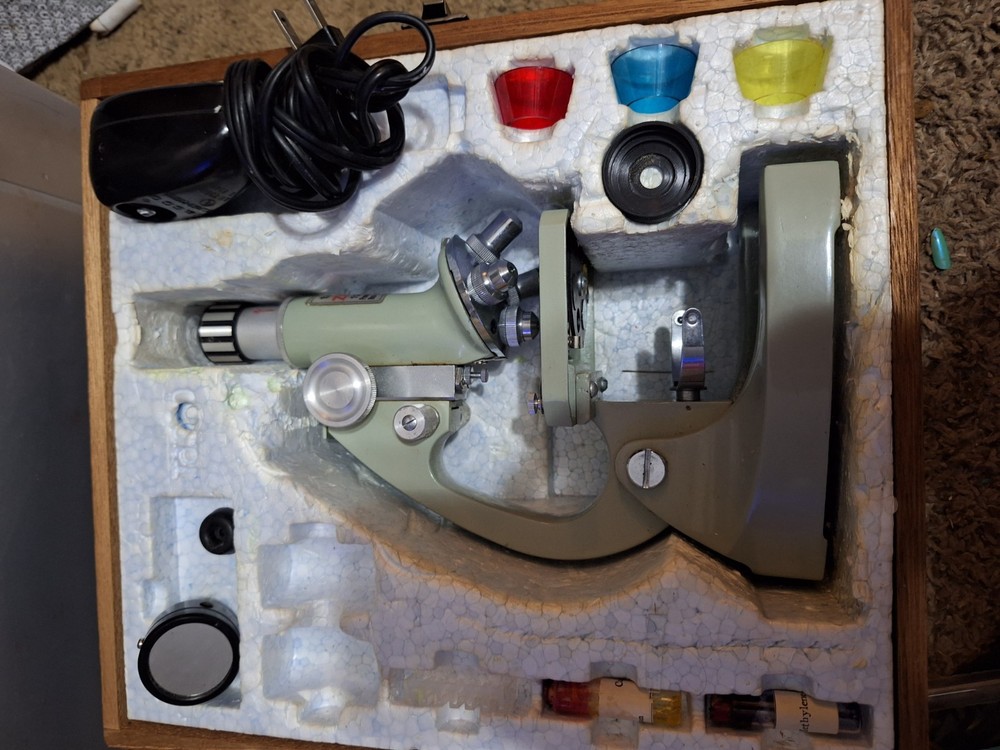 Vintage Tasco 900X Zoom Microscope.