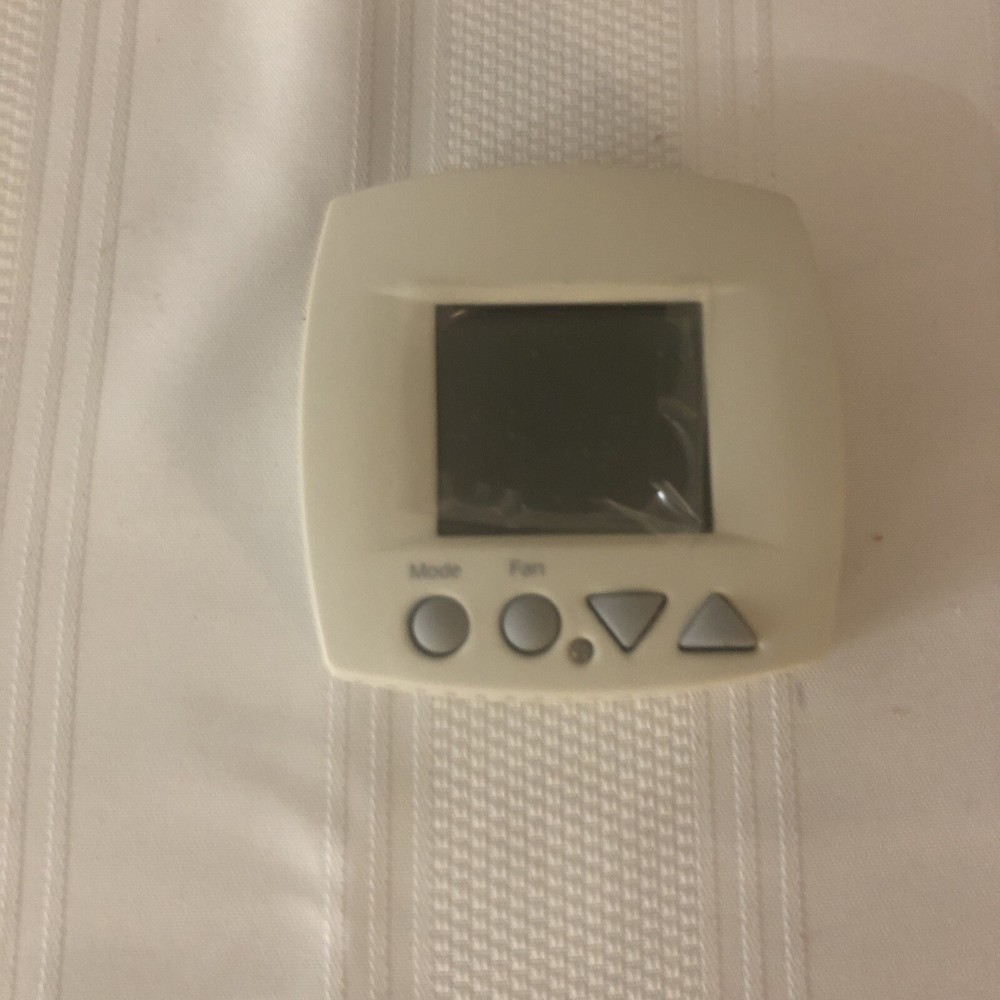 Johnson Controls Non Programmable Thermostat. Model T701DFN-1