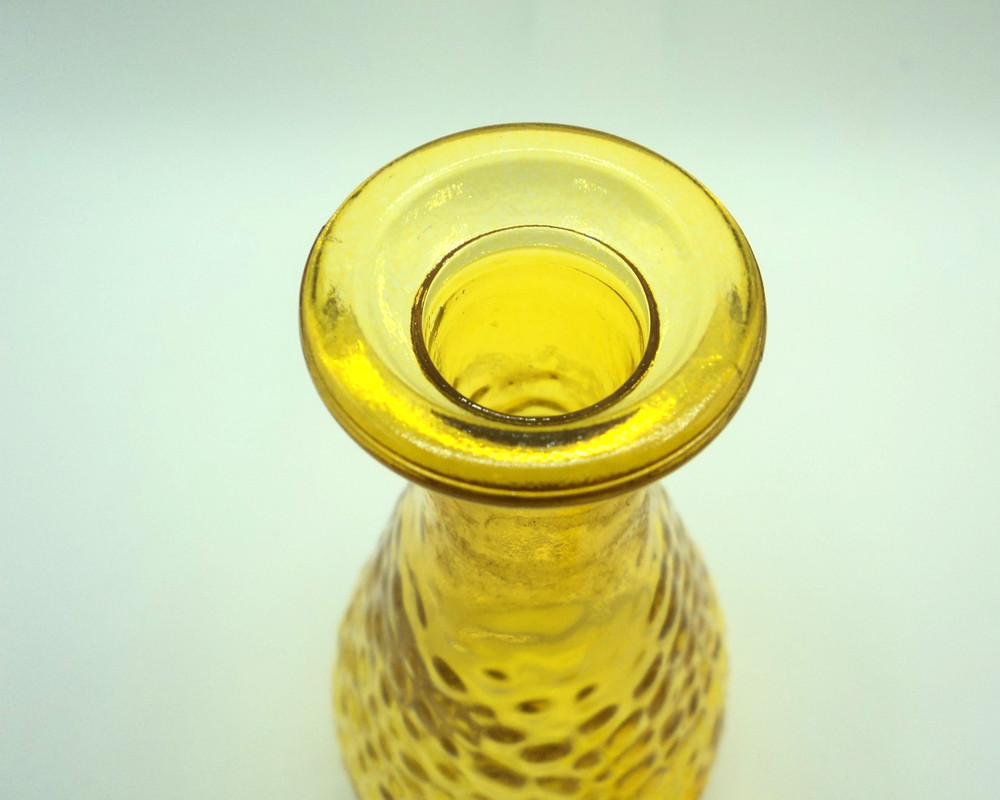 Vintage Yellow Glass Bottle with Plastic Leaf Stopper