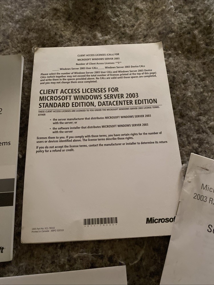 Microsoft Windows Server 2003 R2, 5 Licenses - New - Plastic Ripped