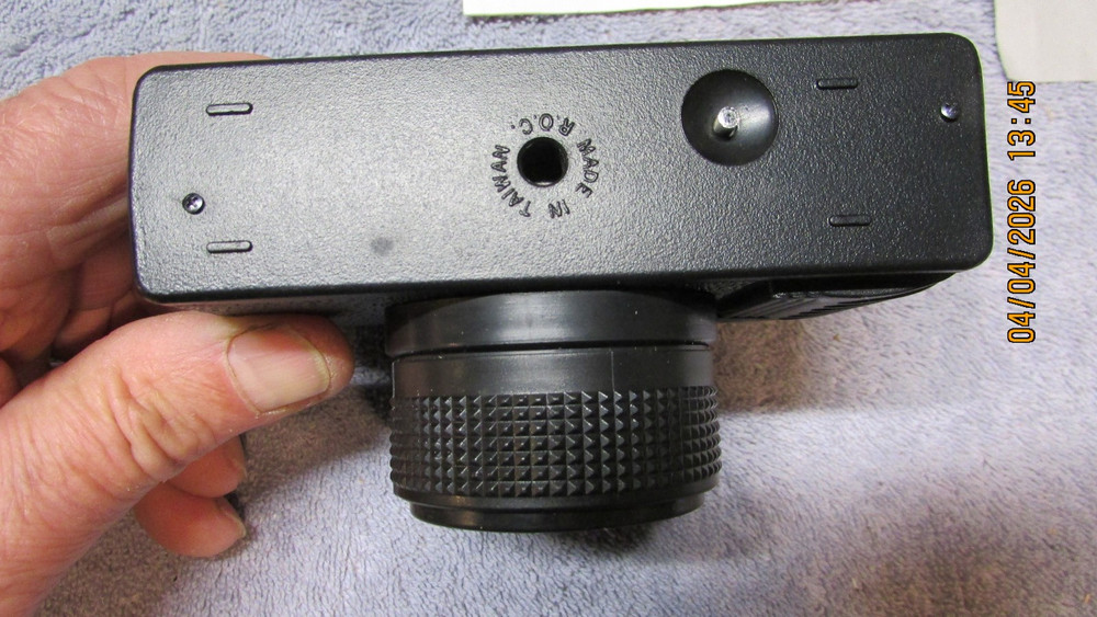 3 vintage cameras.