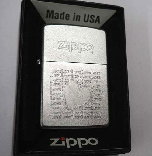 Retired Engraved Lovers Heart Logo Zippo Lighter