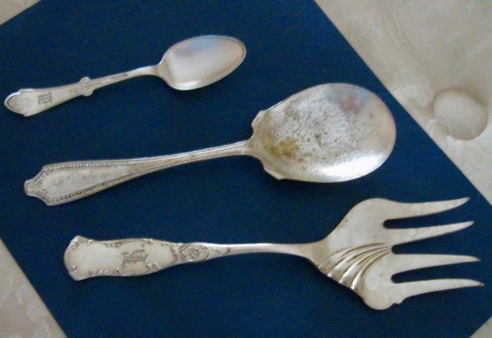 "Assorted silver plate serving pieces-some signed-all cleaned w/silver polish"