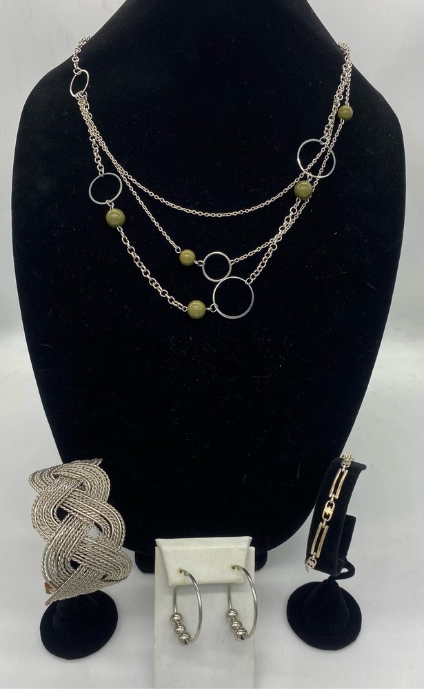 4 piece silver and olive green bead necklace, 2 silver bracelets, and silver loo