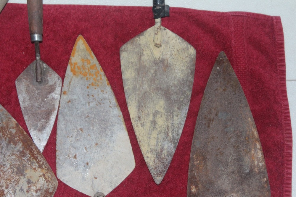 8 Masonary Trowels of Various Sizes