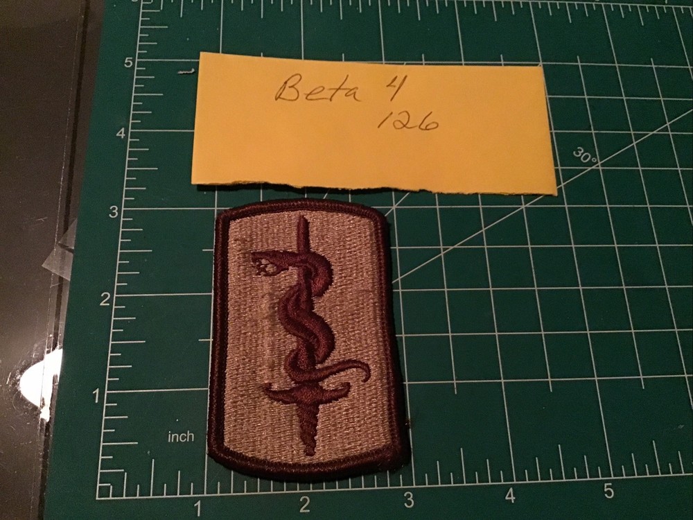 Army Patch: 30th Medical Brigade - tan, merrowed edge