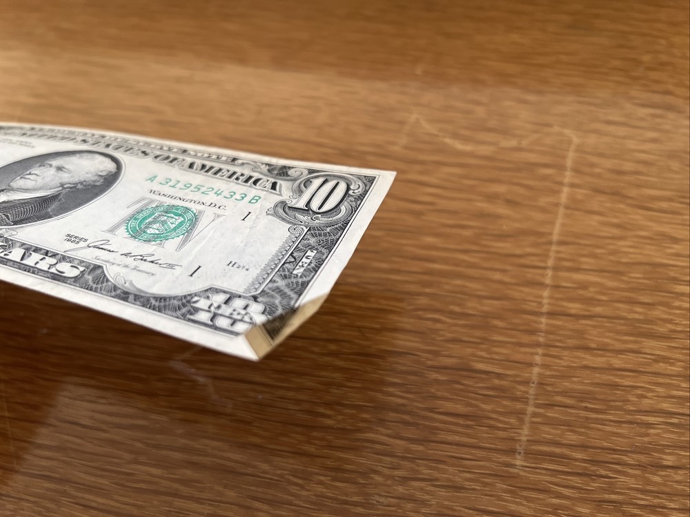 misprint and cut dollar bill