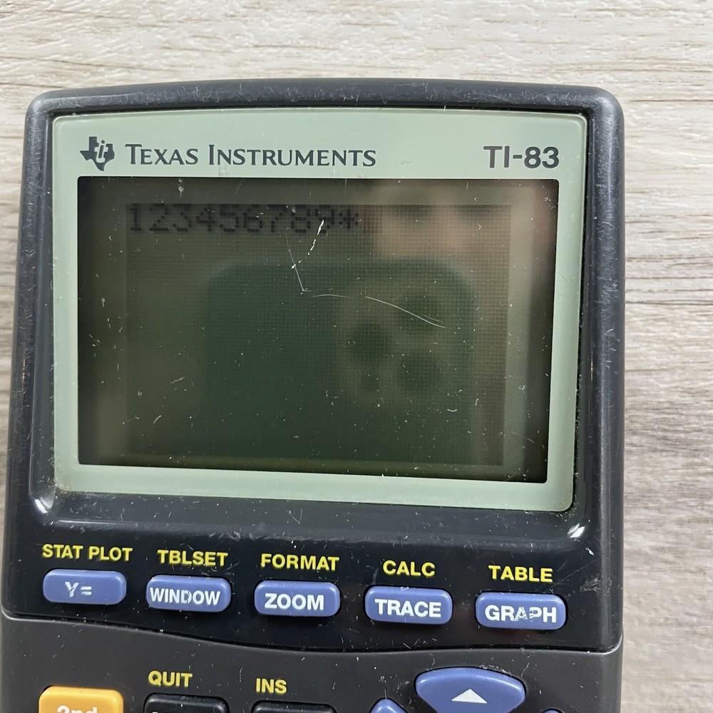 Texas Instruments TI-83 Handheld Graphing Calculator