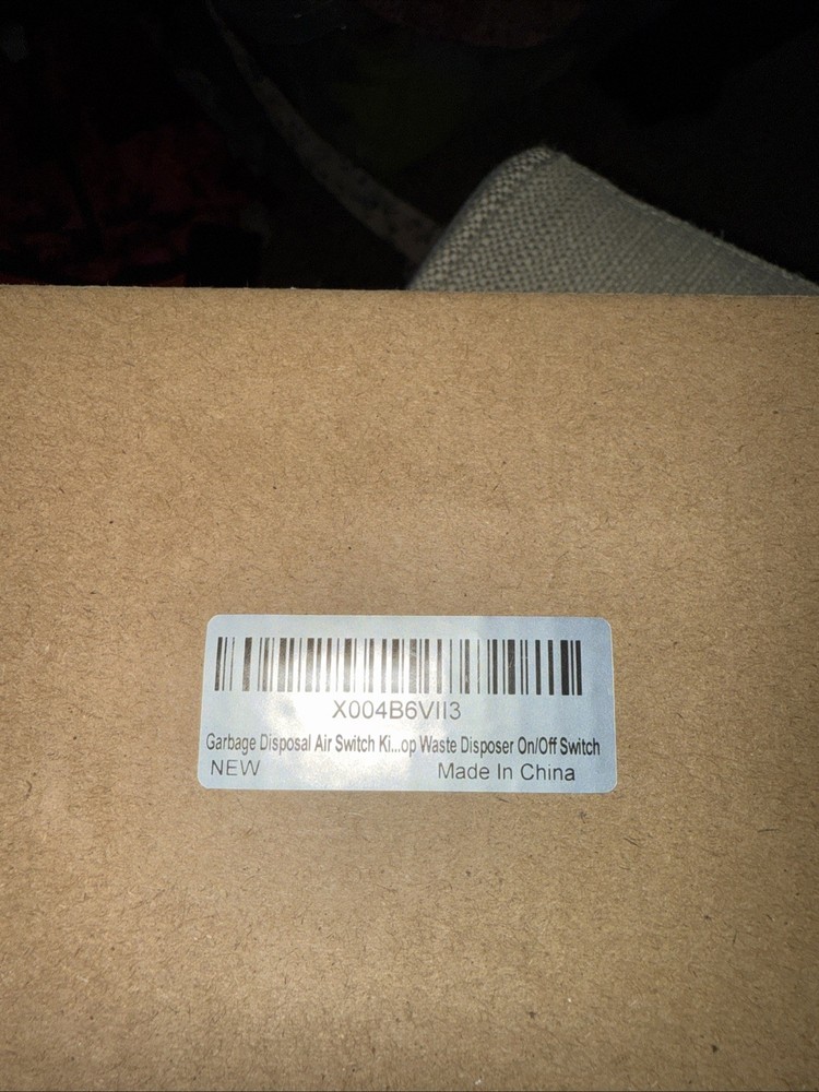 garbage disposal air switch button