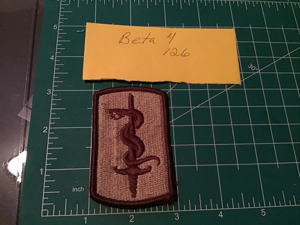 Army Patch: 30th Medical Brigade - tan, merrowed edge