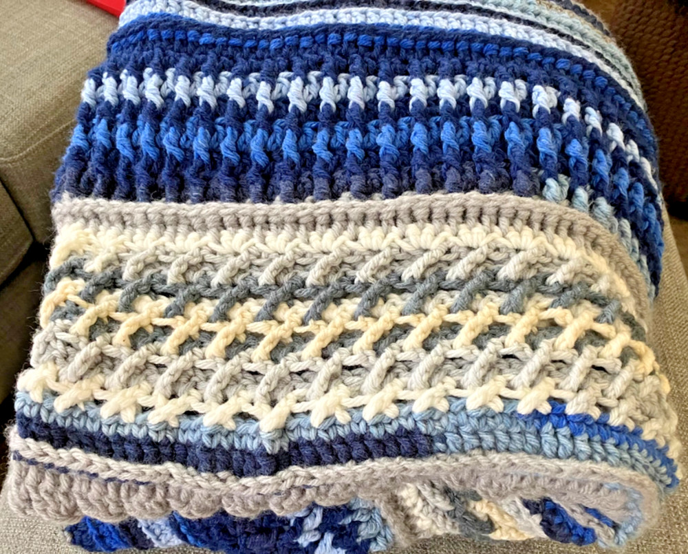 handmade, textured crocheted afghan