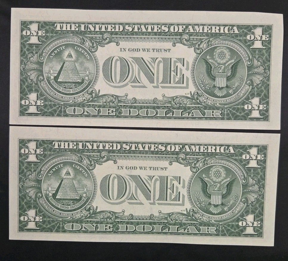 1957-A 2 consecutive silver cert. Dollars. Nice Unc Stars