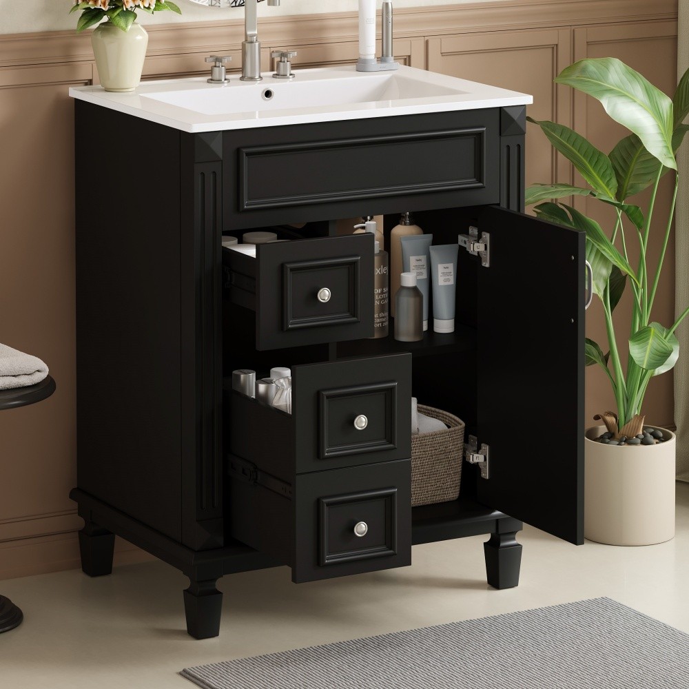 Bathroom vanity W ceramic sink Features two drawers Includes adjustable shelves