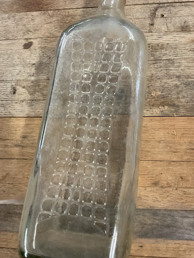 Antique OSO Negro glass bottle empty
