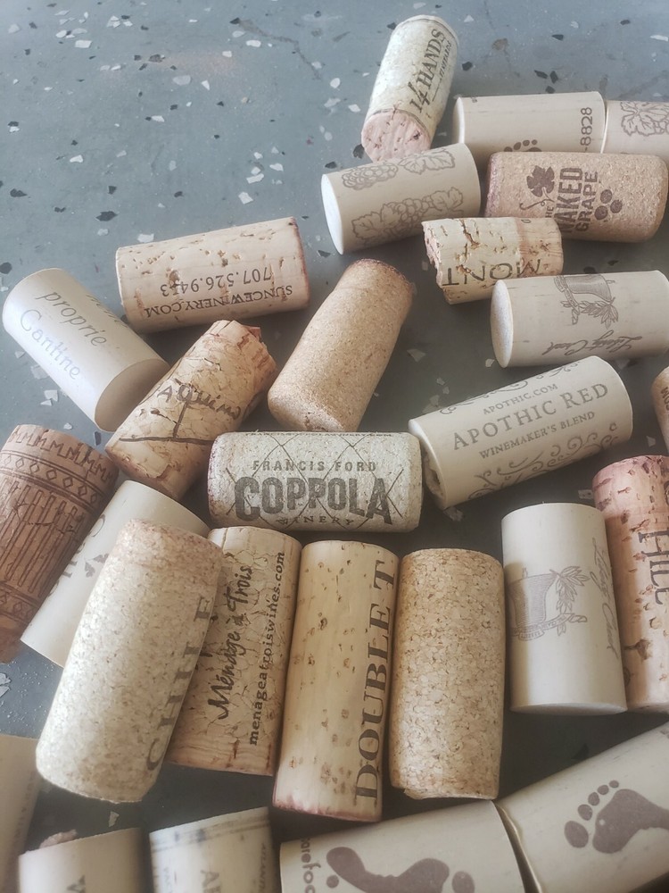 About 85 Used Wine Bottle Corks. Abundant variety.