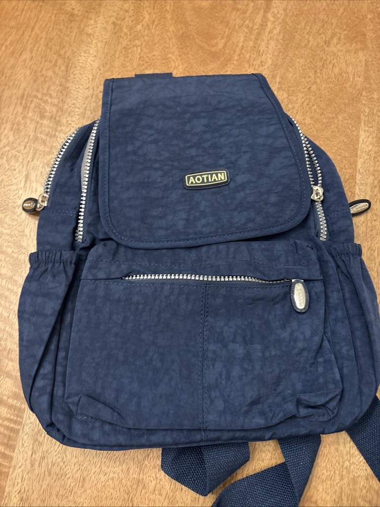 Aotian Medium Backpack Preowned, But Never Used, Gender Neutral, Navy Blue
