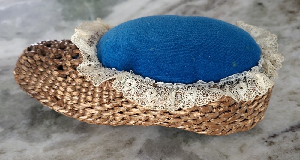VINTAGE WOVEN WICKER PIN CUSHION.
