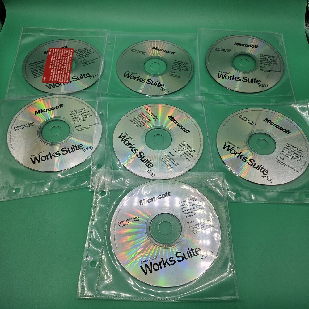 Microsoft Works Suite 2000 - Complete 7 Disc PC CD-ROM Excellent Condition VG+