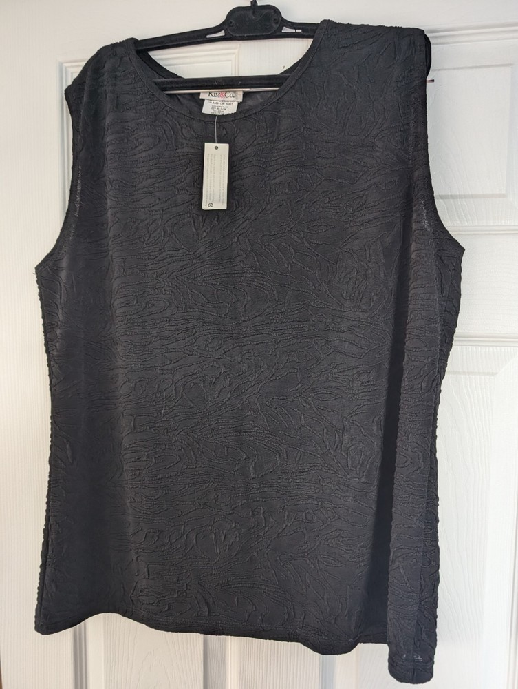 Set Comprising  Camisole and Jacket in black textured material
