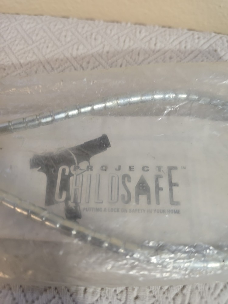 Project Child Safe Lock with Key. Sealed Hand Gun Lock