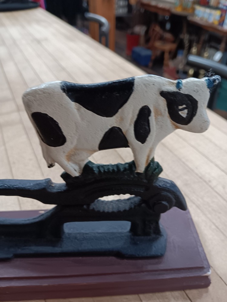Vintage Cast Iron Cow Nutcracker on Wooden Base