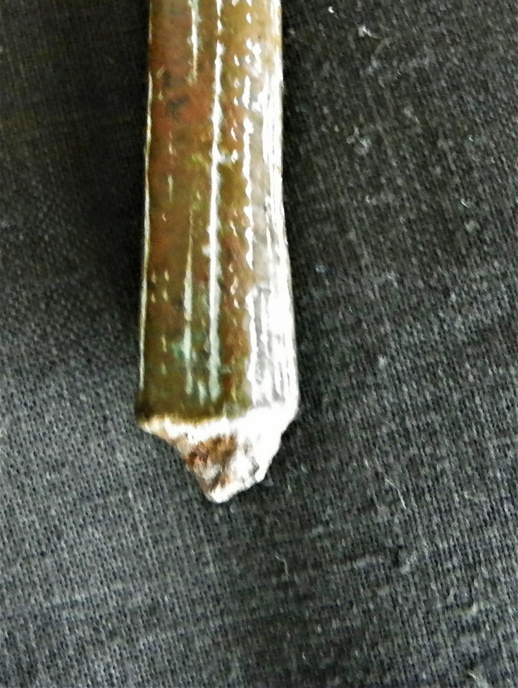 Ancient bronze knife handle