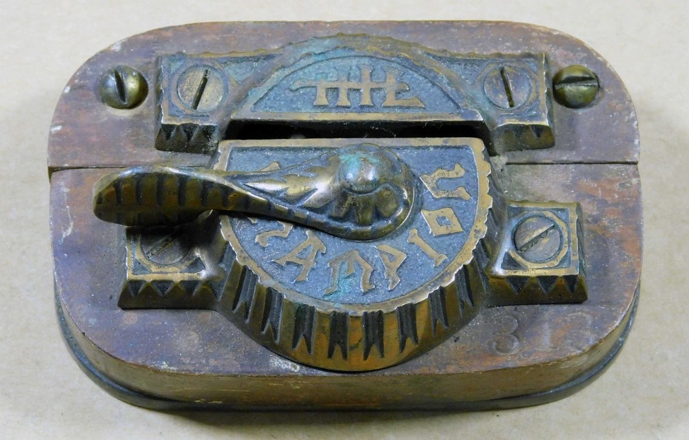 The Champion antique window lock display