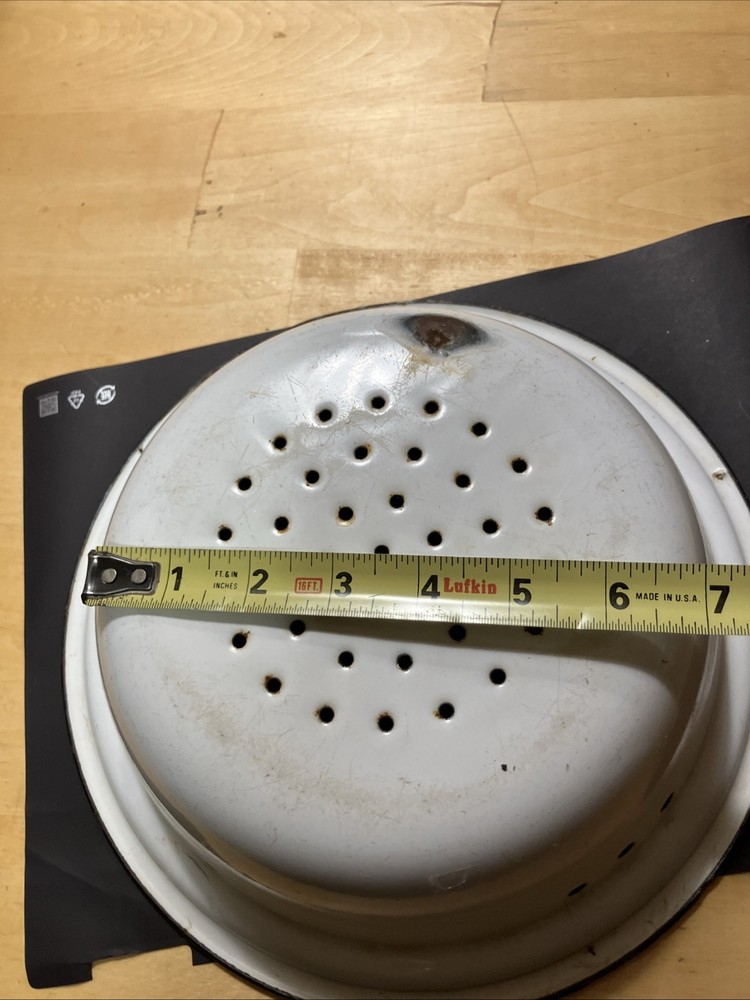 white enamelware colander