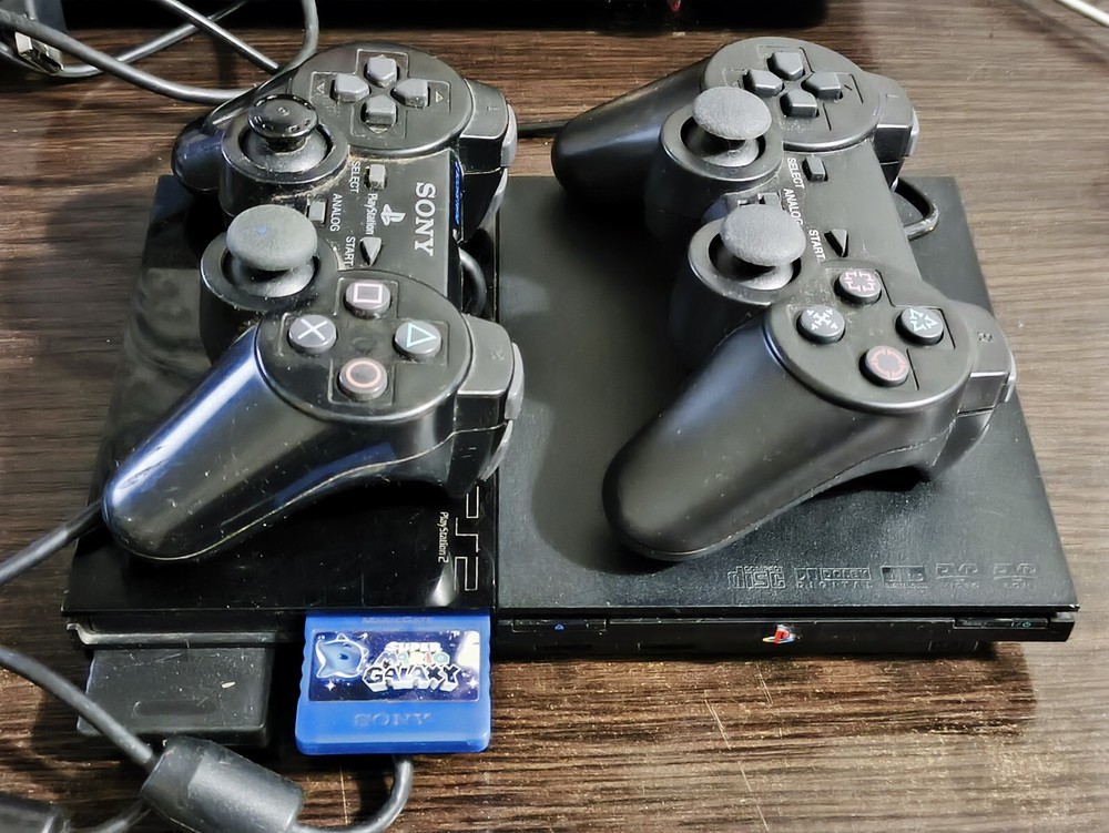 Vintage Sony Playstation 2 console. Game console +2 joysticks