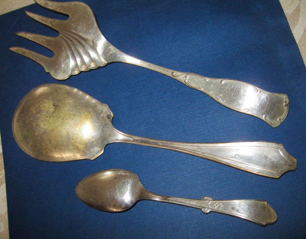 "Assorted silver plate serving pieces-some signed-all cleaned w/silver polish"