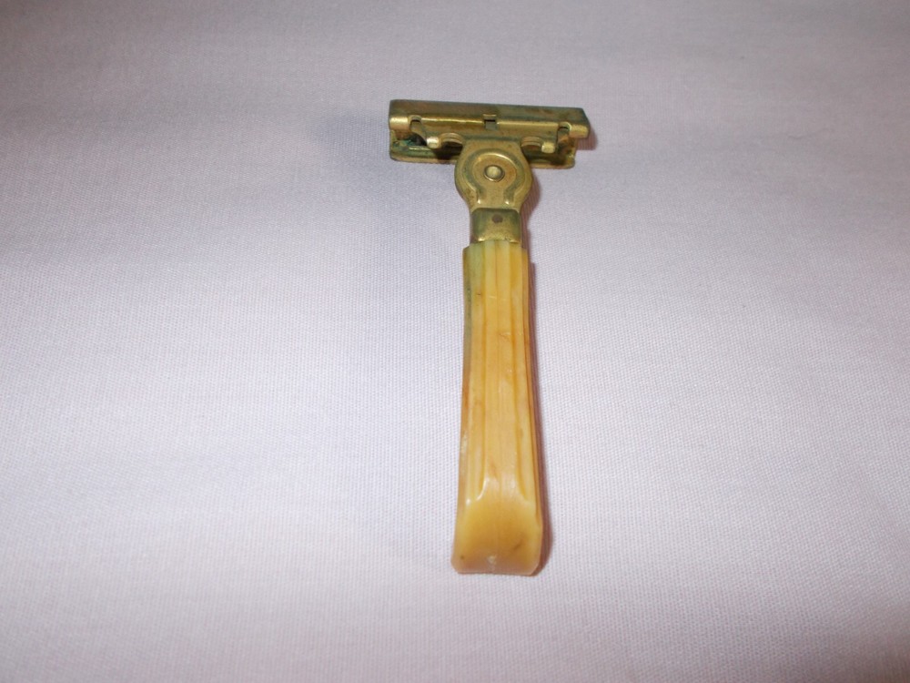 Vintage Schick Razor With Bake Lite Handle Metal Brass