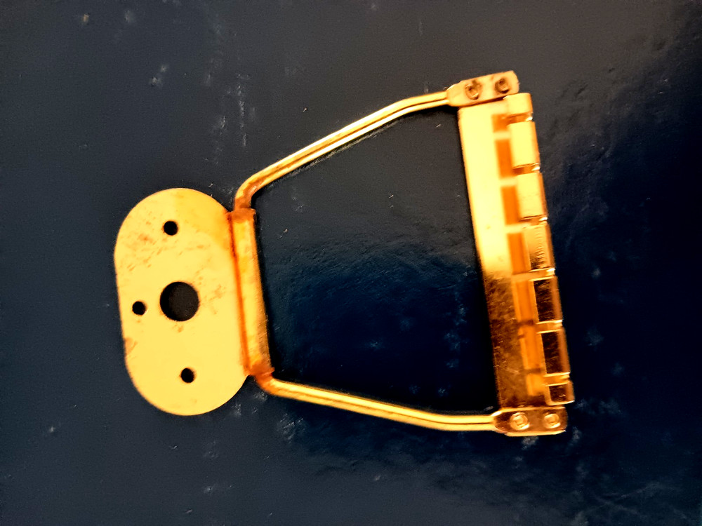 GOLD COLORED TAILPIECE