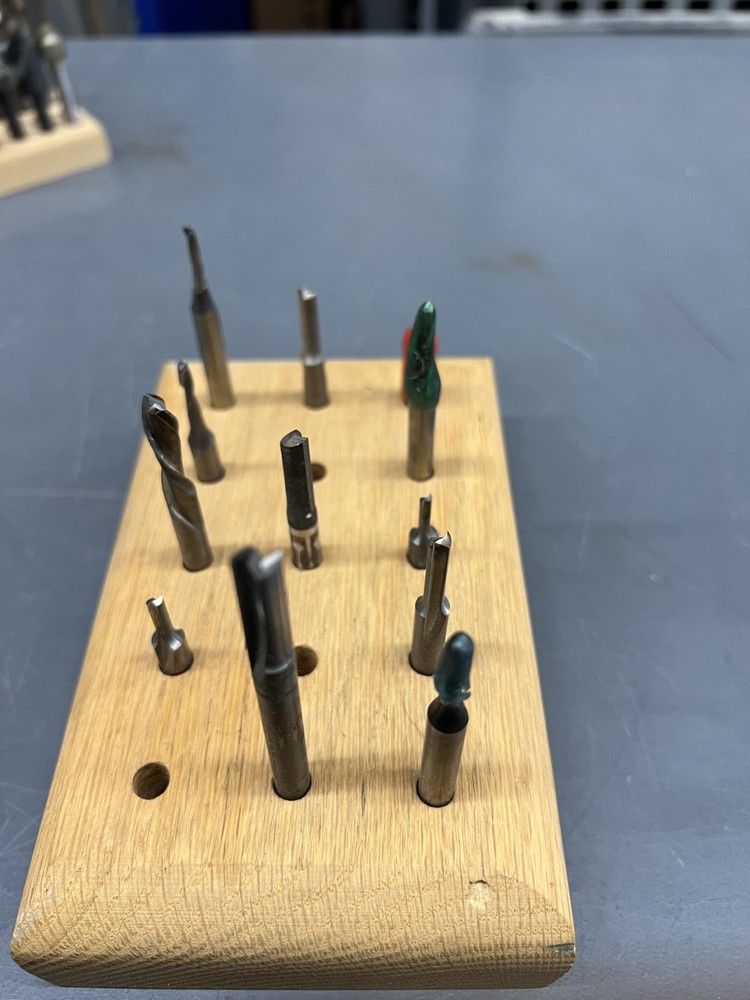 Lot of 12 assorted 1/4" router bits.