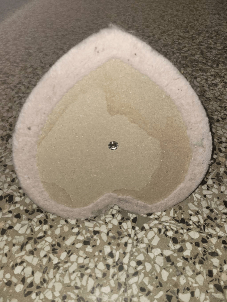 Heart shaped cat scratching post