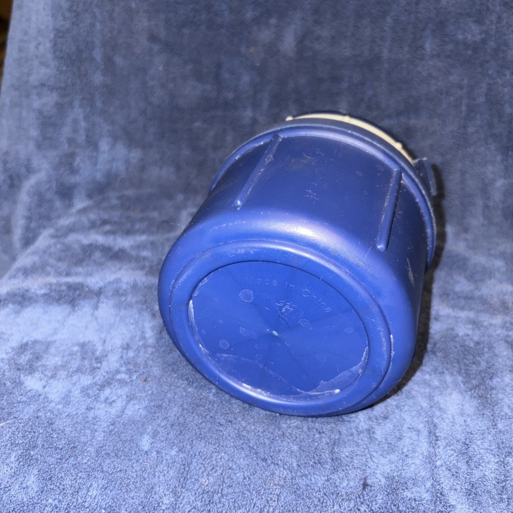 Insulated Food Storage Container With Folding Spoon And Fork